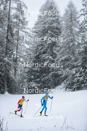 29.12.2021, Lenzerheide, Switzerland (SUI): Johannes Hoesflot Klaebo (NOR), Martin Coradazzi (ITA), (l-r)  - FIS world cup cross-country, tour de ski, 15km men, Lenzerheide (SUI). www.nordicfocus.com. © Modica/NordicFocus. Every downloaded picture is fee-liable.