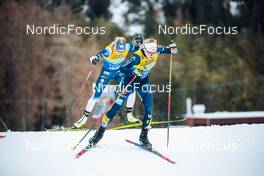 28.12.2021, Lenzerheide, Switzerland (SUI): Victoria Carl (GER), Patricija Eiduka (LAT), (l-r)  - FIS world cup cross-country, tour de ski, individual sprint, Lenzerheide (SUI). www.nordicfocus.com. © Modica/NordicFocus. Every downloaded picture is fee-liable.