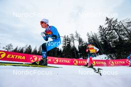 28.12.2021, Lenzerheide, Switzerland (SUI): Lucas Chanavat (FRA), Johannes Hoesflot Klaebo (NOR), (l-r)  - FIS world cup cross-country, tour de ski, individual sprint, Lenzerheide (SUI). www.nordicfocus.com. © Modica/NordicFocus. Every downloaded picture is fee-liable.