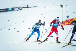 31.12.2021, Oberstdorf, Germany (GER): Jovian Hediger (SUI), Maciej Starega (POL), (l-r)  - FIS world cup cross-country, tour de ski, mass men, Oberstdorf (GER). www.nordicfocus.com. © Modica/NordicFocus. Every downloaded picture is fee-liable.