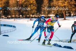31.12.2021, Oberstdorf, Germany (GER): Dario Cologna (SUI), Johannes Hoesflot Klaebo (NOR), (l-r)  - FIS world cup cross-country, tour de ski, mass men, Oberstdorf (GER). www.nordicfocus.com. © Modica/NordicFocus. Every downloaded picture is fee-liable.