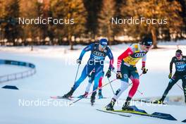 31.12.2021, Oberstdorf, Germany (GER): Dario Cologna (SUI), Johannes Hoesflot Klaebo (NOR), (l-r)  - FIS world cup cross-country, tour de ski, mass men, Oberstdorf (GER). www.nordicfocus.com. © Modica/NordicFocus. Every downloaded picture is fee-liable.