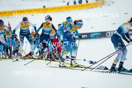 31.12.2021, Oberstdorf, Germany (GER): Anne Kylloenen (FIN), Anamarija Lampic (SLO), (l-r)  - FIS world cup cross-country, tour de ski, mass women, Oberstdorf (GER). www.nordicfocus.com. © Modica/NordicFocus. Every downloaded picture is fee-liable.
