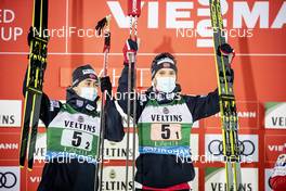24.01.2021 Lahti, Finland (FIN): Jarl Magnus Riiber (NOR), Joergen Graabak (NOR), (l-r) - FIS world cup nordic combined men, team sprint HS130/2x7.5km, Lahti (FIN). www.nordicfocus.com. © Modica/NordicFocus. Every downloaded picture is fee-liable.