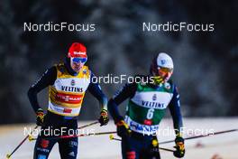 28.11.2021, Ruka, Finland (FIN): Mario Seidl (AUT), Manuel Faisst (GER), (l-r)  - FIS world cup nordic combined men, individual gundersen HS142/10km, Ruka (FIN). www.nordicfocus.com. © Thibaut/NordicFocus. Every downloaded picture is fee-liable.