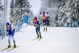 11.12.2021, Otepaeae, Estonia (EST): Ilkka Herola (FIN), Eric Frenzel (GER), Jarl Magnus Riiber (NOR), (l-r)  - FIS world cup nordic combined men, Mass Start HS97/10km, Otepaeae (EST). www.nordicfocus.com. © Volk/NordicFocus. Every downloaded picture is fee-liable.