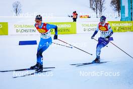 18.12.2021, Ramsau, Austria (AUT): Edgar Vallet (FRA), Otto Niittykoski (FIN), (l-r)  - FIS world cup nordic combined men, individual gundersen HS98/10km, Ramsau (AUT). www.nordicfocus.com. © Volk/NordicFocus. Every downloaded picture is fee-liable.