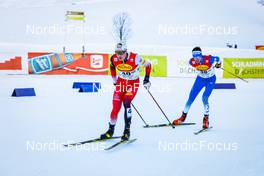 18.12.2021, Ramsau, Austria (AUT): Marc Luis Rainer (AUT), Gasper Brecl (SLO), (l-r)  - FIS world cup nordic combined men, individual gundersen HS98/10km, Ramsau (AUT). www.nordicfocus.com. © Volk/NordicFocus. Every downloaded picture is fee-liable.