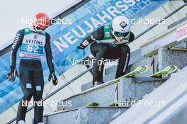31.12.2020, Garmisch, Germany (GER): Markus Eisenbichler (GER), Kamil Stoch (POL), (l-r) - FIS world cup ski jumping men, four hills tournament, qualification, individual HS142, Garmisch (GER). www.nordicfocus.com. © EXPA/JFK/NordicFocus. Every downloaded picture is fee-liable.