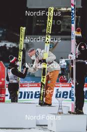 06.01.2021, Bischofshofen, Austria (AUT): Kamil Stoch (POL), Karl Geiger (GER), Dawid Kubacki (POL), (l-r) - FIS world cup ski jumping men, four hills tournament, individual HS142, Bischofshofen (AUT). www.nordicfocus.com. © EXPA/JFK/NordicFocus. Every downloaded picture is fee-liable.