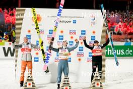 27.02.2021, Oberstdorf, Germany (GER): Karl Geiger (GER), Piotr Zyla (POL), Anze Lanisek (SLO), (l-r)  - FIS nordic world ski championships ski jumping men, individual HS106, Oberstdorf (GER). www.nordicfocus.com. © Thibaut/NordicFocus. Every downloaded picture is fee-liable.