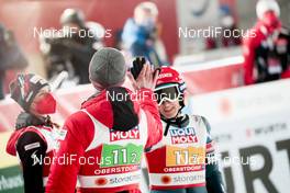 28.02.2021, Oberstdorf, Germany (GER): Michael Hayboeck (AUT), Daniela Iraschko-Stolz (AUT), (l-r)  - FIS nordic world ski championships ski jumping men, mixed team HS106, Oberstdorf (GER). www.nordicfocus.com. © Modica/NordicFocus. Every downloaded picture is fee-liable.