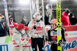 28.02.2021, Oberstdorf, Germany (GER): Markus Eisenbichler (GER), Katharina Althaus (GER), Anna Rupprecht (GER), Karl Geiger (GER), (l-r)  - FIS nordic world ski championships ski jumping men, mixed team HS106, Oberstdorf (GER). www.nordicfocus.com. © Modica/NordicFocus. Every downloaded picture is fee-liable.