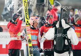 06.03.2021, Oberstdorf, Germany (GER): Jan Hoerl (AUT), Stefan Kraft (AUT), Philipp Aschenwald (AUT), (l-r) - FIS nordic world ski championships ski jumping men, team HS137, Oberstdorf (GER). www.nordicfocus.com. © Thibaut/NordicFocus. Every downloaded picture is fee-liable.