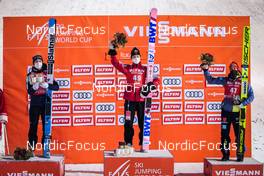 27.11.2021, Ruka, Finland (FIN): Anze Lanisek (SLO), Ryoyu Kobayashi (JPN), Markus Eisenbichler (GER), (l-r) - FIS world cup ski jumping men, individual HS142, Ruka (FIN). www.nordicfocus.com. © Modica/NordicFocus. Every downloaded picture is fee-liable.
