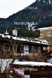 29.12.2021, Oberstdorf, Germany (GER): feature: old house; Schattenbergschanze in the background - FIS world cup ski jumping men, four hills tournament, individual HS137, Oberstdorf (GER). www.nordicfocus.com. © Reichert/NordicFocus. Every downloaded picture is fee-liable.