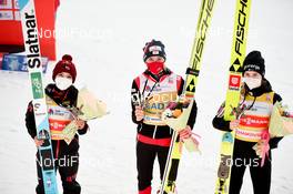 26.03.2021, Chaikovsky, Russia (RUS): Sara Takanashi (JPN), Marita Kramer (AUT), Nika Kriznar (SLO), (l-r) - FIS world cup ski jumping women, individual HS102, Chaikovsky (RUS). www.nordicfocus.com. © Tumashov/NordicFocus. Every downloaded picture is fee-liable.