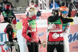 26.02.2021, Oberstdorf, Germany (GER): Chiara Hoelzl (AUT), Sophie Sorschag (AUT), Daniela Iraschko-Stolz (AUT), Marita Kramer (AUT), (l-r)  - FIS nordic world ski championships ski jumping women, team HS106, Oberstdorf (GER). www.nordicfocus.com. © Modica/NordicFocus. Every downloaded picture is fee-liable.