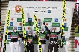 26.02.2021, Oberstdorf, Germany (GER): Maren Lundby (NOR), Thea Minyan Bjoerseth (NOR), Anna Odine Stroem (NOR), Silje Opseth (NOR), (l-r)  - FIS nordic world ski championships ski jumping women, team HS106, Oberstdorf (GER). www.nordicfocus.com. © Modica/NordicFocus. Every downloaded picture is fee-liable.