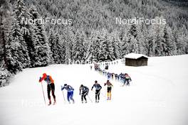 31.01.2021, Val di Fiemme, Italy (ITA): Runar Skaug Mathisen (NOR) leads a group of athletes on the track - Visma Ski Classics Marcialonga, Val di Fiemme (ITA). www.nordicfocus.com. © Modica/NordicFocus. Every downloaded picture is fee-liable.