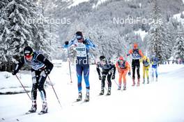 31.01.2021, Val di Fiemme, Italy (ITA): Event Feature: Track atmosphere with a hobby athlete in the middle of the top cracks  - Visma Ski Classics Marcialonga, Val di Fiemme (ITA). www.nordicfocus.com. © Modica/NordicFocus. Every downloaded picture is fee-liable.
