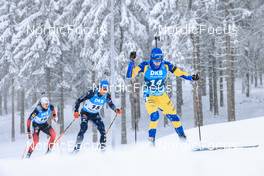 09.01.2022, Oberhof, Germany (GER): Sebastian Samuelsson (SWE), Erik Lesser (GER), Vetle Sjaastad Christiansen (NOR), (l-r) -  IBU World Cup Biathlon, pursuit men, Oberhof (GER). www.nordicfocus.com. © Manzoni/NordicFocus. Every downloaded picture is fee-liable.