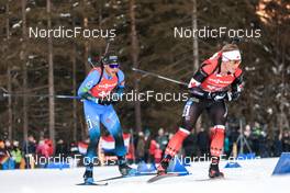 16.01.2022, Ruhpolding, Germany (GER): Scott Gow (CAN), Antonin Guigonnat (FRA), (l-r) - IBU World Cup Biathlon, pursuit men, Ruhpolding (GER). www.nordicfocus.com. © Manzoni/NordicFocus. Every downloaded picture is fee-liable.
