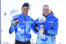 20.03.2022, Oslo, Norway (NOR): Quentin Fillon Maillet (FRA), Olle Dahlin (SWE), IBU President, (l-r) - IBU World Cup Biathlon, cups, Oslo (NOR). www.nordicfocus.com. © Manzoni/NordicFocus. Every downloaded picture is fee-liable.