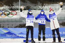 08.02.2022, Beijing, China (CHN): Anton Smolski (BLR), Quentin Fillon Maillet (FRA), Johannes Thingnes Boe (NOR), (l-r) - XXIV. Olympic Winter Games Beijing 2022, Biathlon, individual men, Beijing (CHN). www.nordicfocus.com. © Manzoni/NordicFocus. Every downloaded picture is fee-liable.