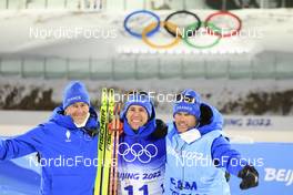 08.02.2022, Beijing, China (CHN): Patrick Favre (ITA), coach Team France, Quentin Fillon Maillet (FRA), Vincent Vittoz (FRA), (l-r) - XXIV. Olympic Winter Games Beijing 2022, Biathlon, individual men, Beijing (CHN). www.nordicfocus.com. © Manzoni/NordicFocus. Every downloaded picture is fee-liable.
