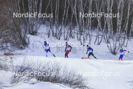 18.02.2022, Beijing, China (CHN): Quentin Fillon Maillet (FRA), Johannes Thingnes Boe (NOR), Anton Smolski (BLR), Eduard Latypov (ROC), (l-r) - XXIV. Olympic Winter Games Beijing 2022, Biathlon, mass men, Beijing (CHN). www.nordicfocus.com. © Manzoni/NordicFocus. Every downloaded picture is fee-liable.