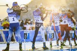 18.02.2022, Beijing, China (CHN): Quentin Fillon Maillet (FRA), Tero Seppala (FIN), (l-r) - XXIV. Olympic Winter Games Beijing 2022, Biathlon, mass men, Beijing (CHN). www.nordicfocus.com. © Manzoni/NordicFocus. Every downloaded picture is fee-liable.