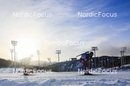 18.02.2022, Beijing, China (CHN): Christian Gow (CAN), Simon Eder (AUT), (l-r) - XXIV. Olympic Winter Games Beijing 2022, Biathlon, mass men, Beijing (CHN). www.nordicfocus.com. © Manzoni/NordicFocus. Every downloaded picture is fee-liable.