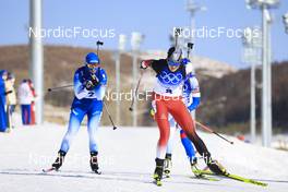 18.02.2022, Beijing, China (CHN): Anais Bescond (FRA), Lisa Theresa Hauser (AUT), (l-r) - XXIV. Olympic Winter Games Beijing 2022, Biathlon, mass women, Beijing (CHN). www.nordicfocus.com. © Manzoni/NordicFocus. Every downloaded picture is fee-liable.