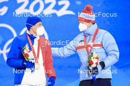 09.02.2022, Beijing, China (CHN): Quentin Fillon Maillet (FRA), Johannes Thingnes Boe (NOR), (l-r) - XXIV. Olympic Winter Games Beijing 2022, Biathlon, medals, Beijing (CHN). www.nordicfocus.com. © Manzoni/NordicFocus. Every downloaded picture is fee-liable.
