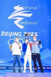 09.02.2022, Beijing, China (CHN): Anton Smolski (BLR), Quentin Fillon Maillet (FRA), Johannes Thingnes Boe (NOR), (l-r) - XXIV. Olympic Winter Games Beijing 2022, Biathlon, medals, Beijing (CHN). www.nordicfocus.com. © Manzoni/NordicFocus. Every downloaded picture is fee-liable.