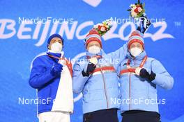 14.02.2022, Beijing, China (CHN): Quentin Fillon Maillet (FRA), Johannes Thingnes Boe (NOR), Tarjei Boe (NOR), (l-r) - XXIV. Olympic Winter Games Beijing 2022, Biathlon, medals, Beijing (CHN). www.nordicfocus.com. © Manzoni/NordicFocus. Every downloaded picture is fee-liable.