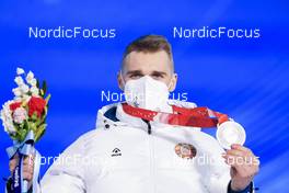 09.02.2022, Beijing, China (CHN): Anton Smolski (BLR) - XXIV. Olympic Winter Games Beijing 2022, Biathlon, medals, Beijing (CHN). www.nordicfocus.com. © Manzoni/NordicFocus. Every downloaded picture is fee-liable.