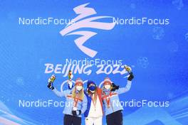 19.02.2022, Beijing, China (CHN): Tiril Eckhoff (NOR), Justine Braisaz-Bouchet (FRA), Marte Olsbu Roeiseland (NOR), (l-r) - XXIV. Olympic Winter Games Beijing 2022, Biathlon, medals, Beijing (CHN). www.nordicfocus.com. © Manzoni/NordicFocus. Every downloaded picture is fee-liable.