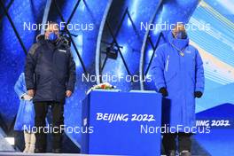 17.02.2022, Beijing, China (CHN): Jim Carrabre (CAN), IBU Executive Board Member, William Frederick Blick (UGA), Member of the International Olympic Committee (l-r) - XXIV. Olympic Winter Games Beijing 2022, Biathlon, medals, Beijing (CHN). www.nordicfocus.com. © Manzoni/NordicFocus. Every downloaded picture is fee-liable.
