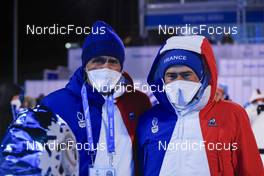 14.02.2022, Beijing, China (CHN): Stephane Bouthiaux (FRA) coach Team France, Patrick Favre (ITA), coach Team France, (l-r) - XXIV. Olympic Winter Games Beijing 2022, Biathlon, medals, Beijing (CHN). www.nordicfocus.com. © Manzoni/NordicFocus. Every downloaded picture is fee-liable.