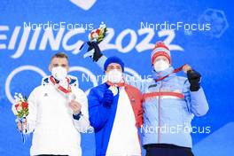 09.02.2022, Beijing, China (CHN): Anton Smolski (BLR), Quentin Fillon Maillet (FRA), Johannes Thingnes Boe (NOR), (l-r) - XXIV. Olympic Winter Games Beijing 2022, Biathlon, medals, Beijing (CHN). www.nordicfocus.com. © Manzoni/NordicFocus. Every downloaded picture is fee-liable.