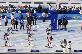 05.02.2022, Beijing, China (CHN): Lisa Vittozzi (ITA), Suvi Minkkinen (FIN), Jessica Jislova (CZE), Hanna Oeberg (SWE), Uliana Nigmatullina (ROC), Vanessa Voigt (GER), Marte Olsbu Roeiseland (NOR), Dzinara Alimbekava (BLR), Anais Chevalier-Bouchet (FRA), (l-r) - XXIV. Olympic Winter Games Beijing 2022, Biathlon, mixed relay, Beijing (CHN). www.nordicfocus.com. © Manzoni/NordicFocus. Every downloaded picture is fee-liable.