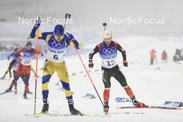 13.02.2022, Beijing, China (CHN): Martin Ponsiluoma (SWE), Christian Gow (CAN), (l-r) - XXIV. Olympic Winter Games Beijing 2022, Biathlon, pursuit men, Beijing (CHN). www.nordicfocus.com. © Manzoni/NordicFocus. Every downloaded picture is fee-liable.