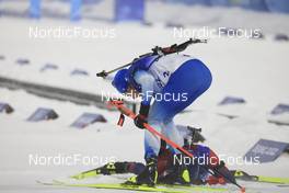 13.02.2022, Beijing, China (CHN): Quentin Fillon Maillet (FRA), Tarjei Boe (NOR), (l-r) - XXIV. Olympic Winter Games Beijing 2022, Biathlon, pursuit men, Beijing (CHN). www.nordicfocus.com. © Manzoni/NordicFocus. Every downloaded picture is fee-liable.