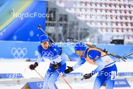 15.02.2022, Beijing, China (CHN): Quentin Fillon Maillet (FRA), Simon Desthieux (FRA), (l-r) - XXIV. Olympic Winter Games Beijing 2022, Biathlon, relay men, Beijing (CHN). www.nordicfocus.com. © Manzoni/NordicFocus. Every downloaded picture is fee-liable.