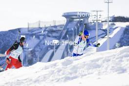 16.02.2022, Beijing, China (CHN): Lisa Theresa Hauser (AUT), Anais Chevalier-Bouchet (FRA), (l-r) - XXIV. Olympic Winter Games Beijing 2022, Biathlon, relay women, Beijing (CHN). www.nordicfocus.com. © Manzoni/NordicFocus. Every downloaded picture is fee-liable.