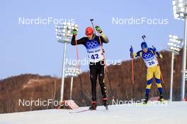 12.02.2022, Beijing, China (CHN): Roman Rees (GER), Martin Ponsiluoma (SWE), (l-r) - XXIV. Olympic Winter Games Beijing 2022, Biathlon, sprint men, Beijing (CHN). www.nordicfocus.com. © Manzoni/NordicFocus. Every downloaded picture is fee-liable.