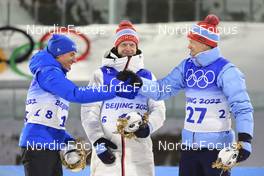 12.02.2022, Beijing, China (CHN): Quentin Fillon Maillet (FRA), Johannes Thingnes Boe (NOR), Tarjei Boe (NOR), (l-r) - XXIV. Olympic Winter Games Beijing 2022, Biathlon, sprint men, Beijing (CHN). www.nordicfocus.com. © Manzoni/NordicFocus. Every downloaded picture is fee-liable.