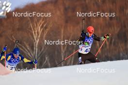 12.02.2022, Beijing, China (CHN): Martin Ponsiluoma (SWE), Roman Rees (GER), (l-r) - XXIV. Olympic Winter Games Beijing 2022, Biathlon, sprint men, Beijing (CHN). www.nordicfocus.com. © Manzoni/NordicFocus. Every downloaded picture is fee-liable.